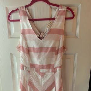 Woman’s pink and white striped romper